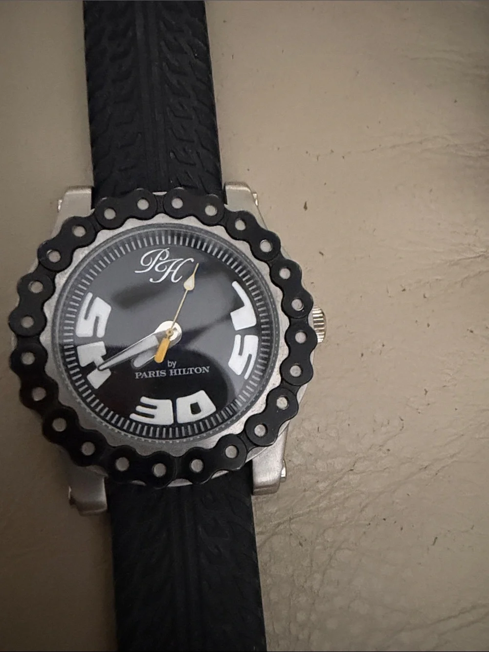Paris Hilton Black Round Dial Wristwatch with Textured Strap
